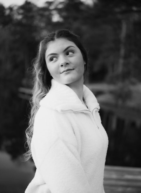 Black-and-white portrait of Leigha Acosta
